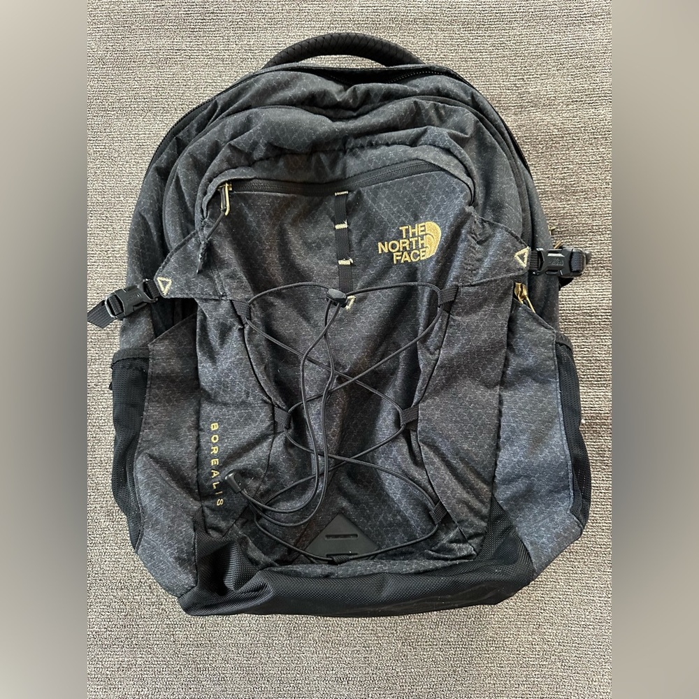The North Face Borealis Backpack in Black and Gold